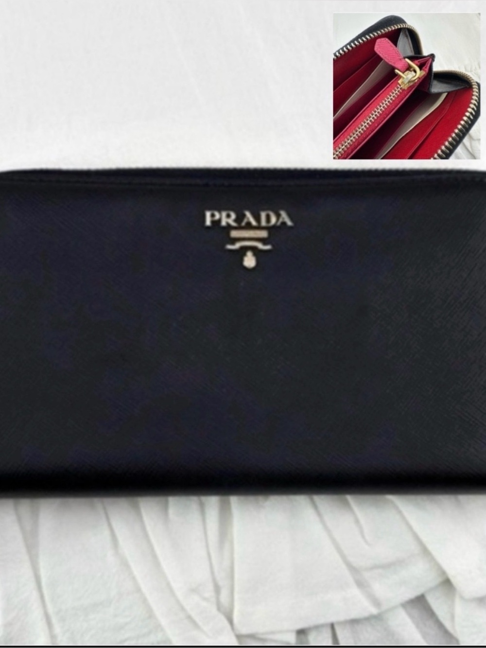 AUTHENTIC Prada wallet. Black with pink interior.